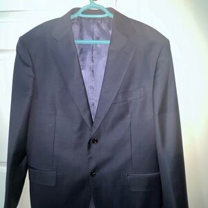 Suit Supply grey suit, perfect for any formal occasion or professional setting.